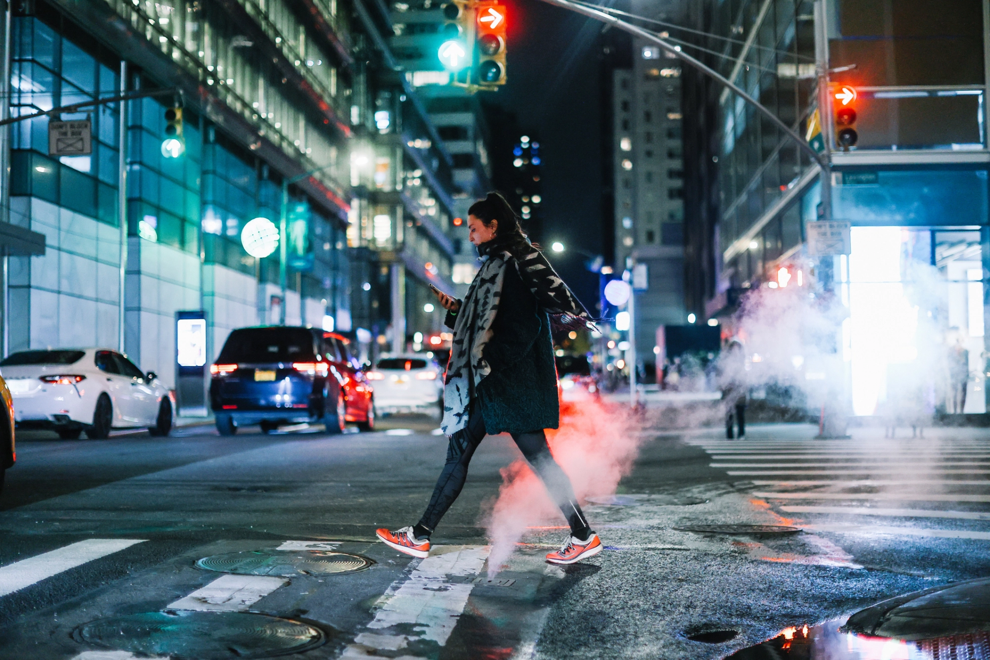 Woman walking in Manhattan on an evening
