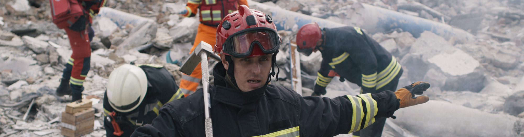 Men speaking  to team during rescue mission