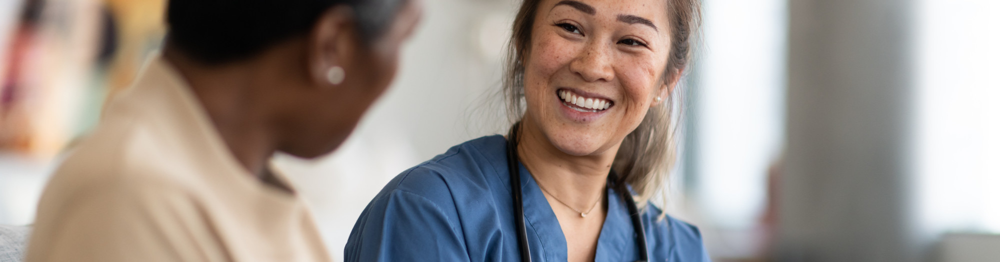 Famale Doctor talking to patient