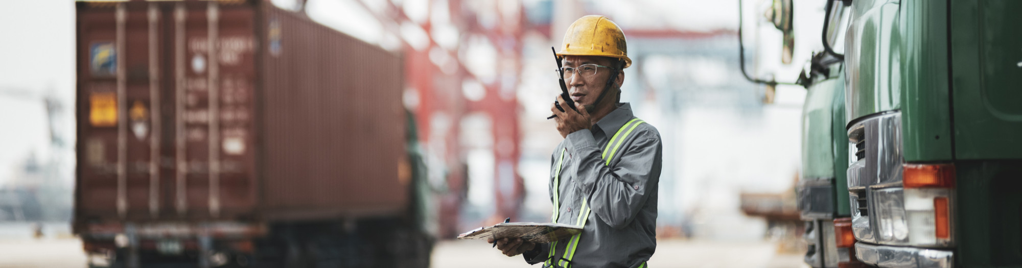 Worker in commerical dock