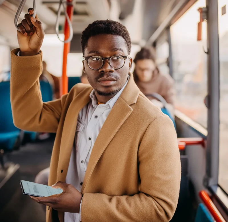Business man travelling by bus