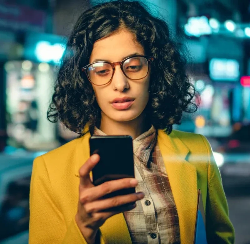 Women using phone, RapidSOS ready badge