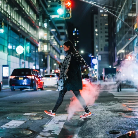 Woman walking in Manhattan on an evening
