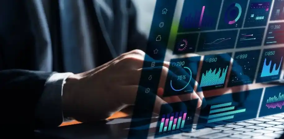 Operator viewing a live data dashboard on a laptop