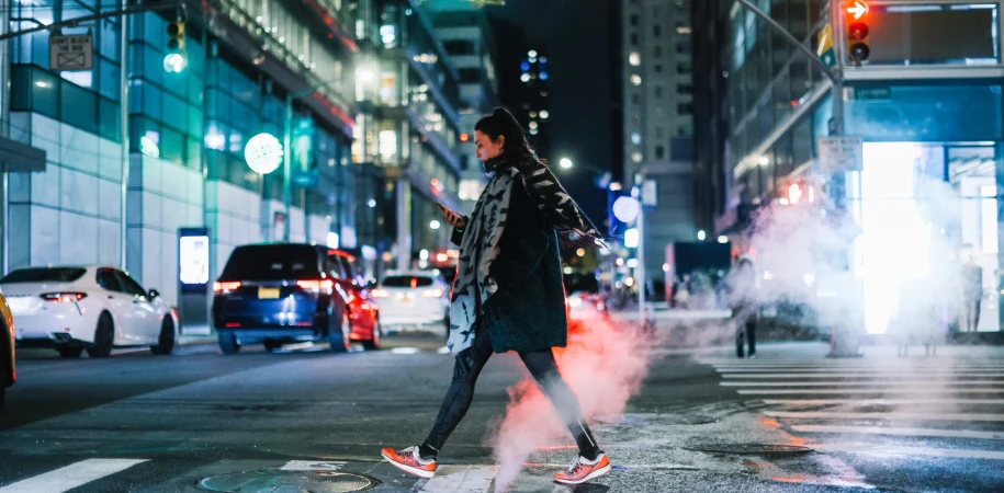Woman walking in Manhattan on an evening