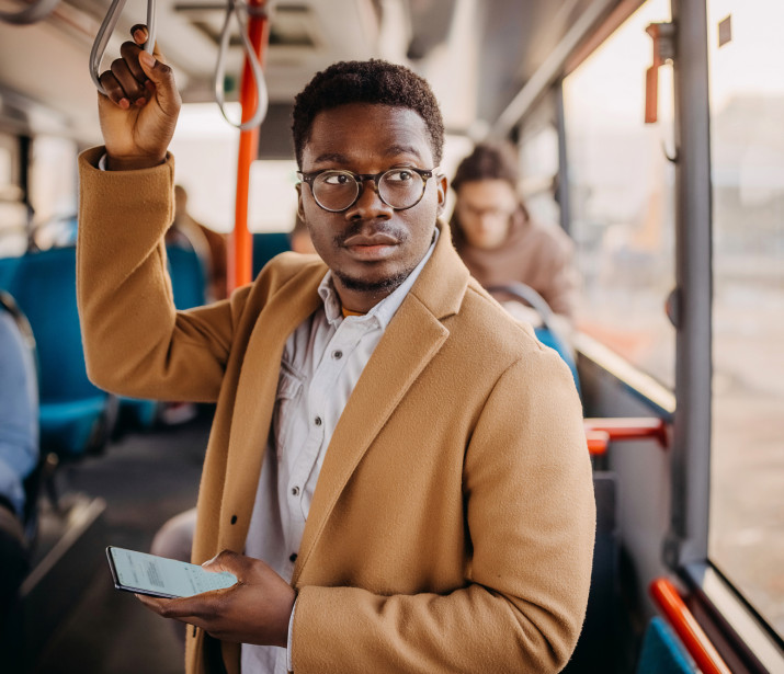 Business man travelling by bus