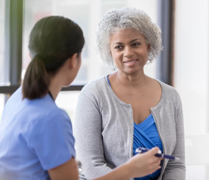 Nurse with patient at home
